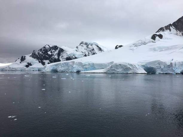 istock Antarctica ice and mountains on the ocean 1078577398