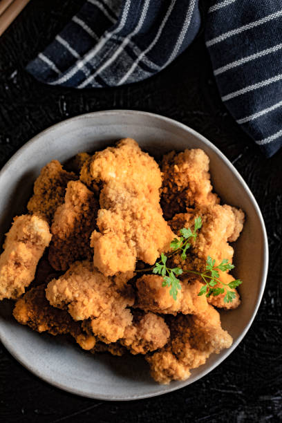 istock Delicious crispy fried chicken breast strips. 1078581348
