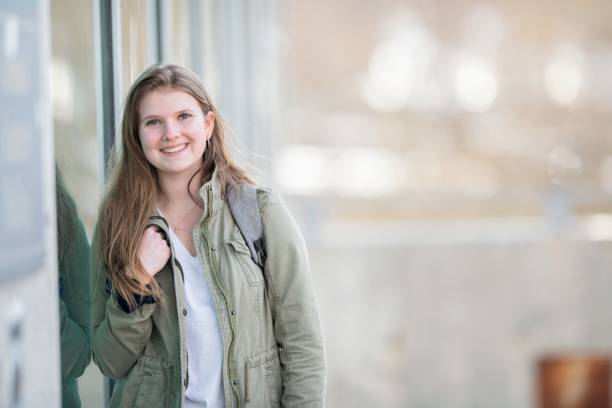 istock Smiling university girl portrait 1078582264