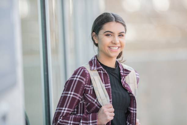 istock Happy university girl 1078582268
