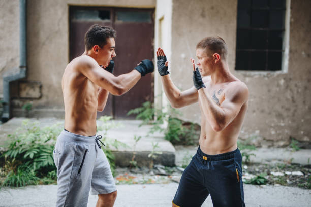 istock Boxing athletes exercising together 1078586922