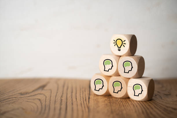 istock many people together having an idea symbolized by icons on cubes 1078588708