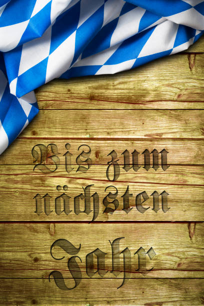 istock bavarian tablecloth on wood with the sentence 