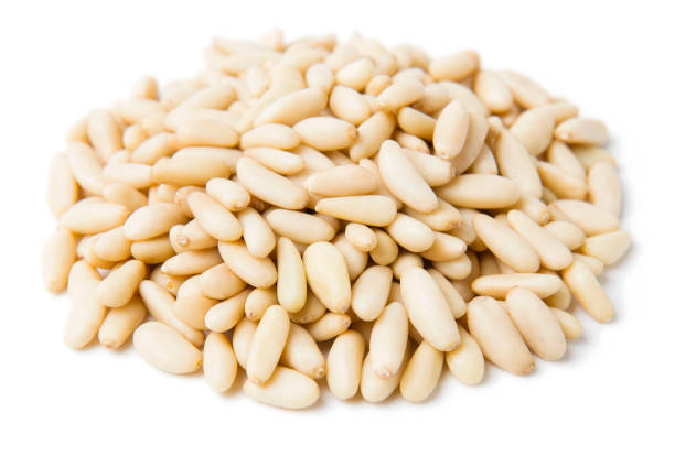 istock A heap of pine nuts on a white background 1078594842
