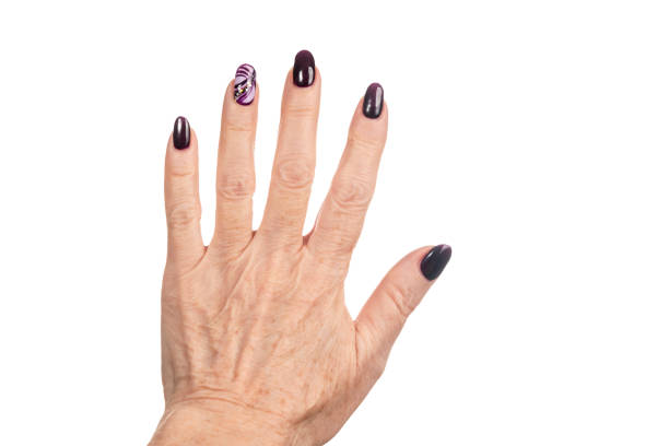 istock old woman hand with manicure 1078616438