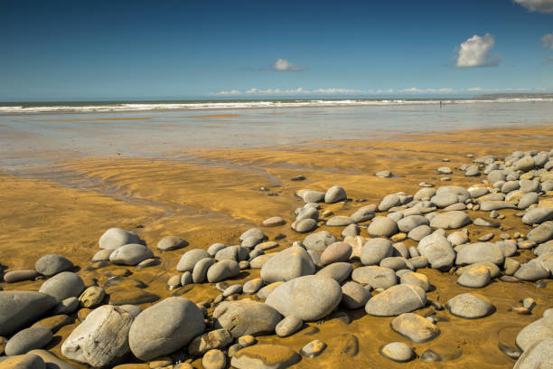 Westward Ho! beach in Devon , England beautiful Westward Ho! beach in North Devon on the English coast bideford stock pictures, royalty-free photos & images