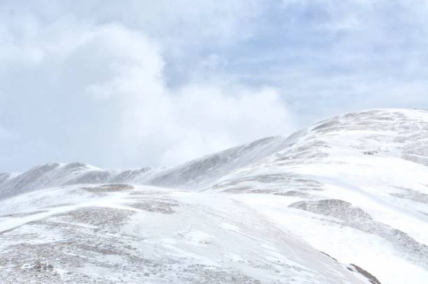 istock Blue sky on snow covered mountain tundra 1078625340