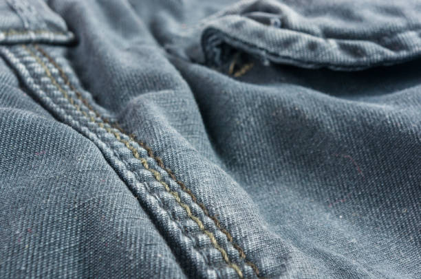 istock clothing items washed cotton fabric texture with seams 1078658386