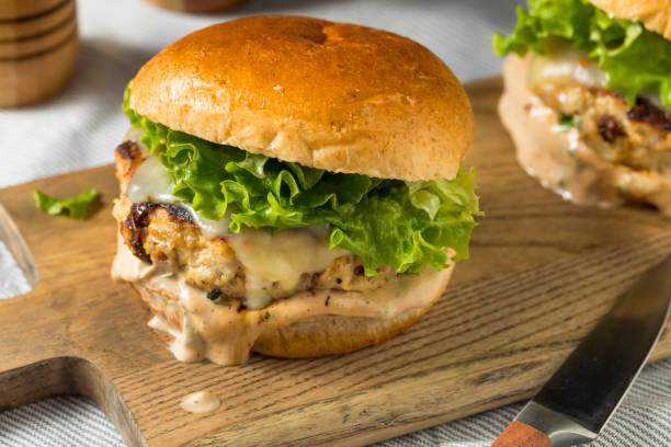 istock Spicy Homemade Chipotle Chicken Burger 1078665620