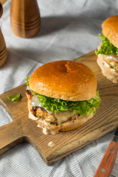 istock Spicy Homemade Chipotle Chicken Burger 1078667794