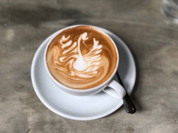 istock High Angle View Of Cappuccino On Table 1078674990