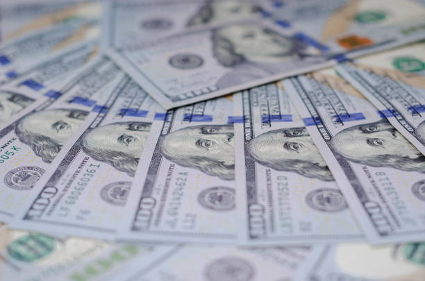 istock hundred dollar bills beautifully laid out 1078687890