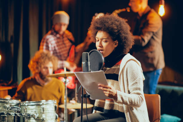 istock Mixed race woman singing. 1078691396