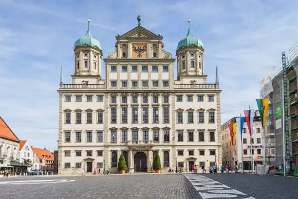 Stock photograph of the Town Hall on Elias Holl Platz in downtown Augsburg, Bavaria, Germany on a sunny day.