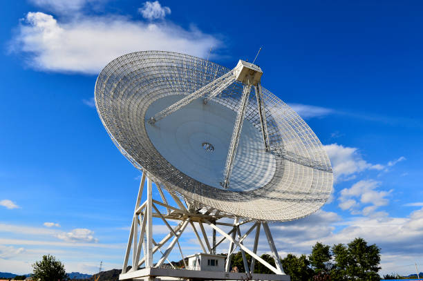 istock Array of satellite dishes or radio antennas against sky. Space o 1078711080