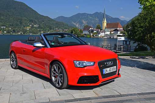 Rottach-Egern, Germany - 2nd July, 2015: Audi RS5 Cabrio parked on the street. The travel in cabriolet vehicle is a big pleasure during the sunny, summer days.
