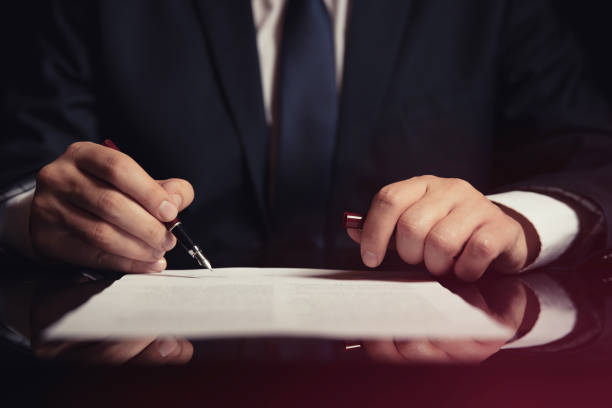 istock Lawyer, attorney signing a contract 1078741182