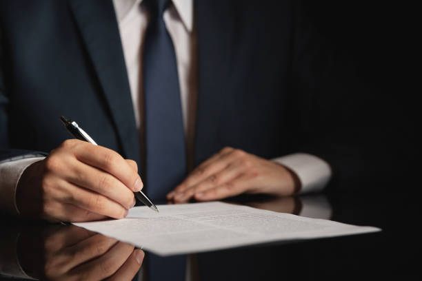 istock Lawyer, attorney signing a contract 1078741216