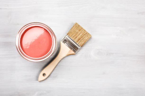 istock Half painted Living Coral wooden board 1078777898