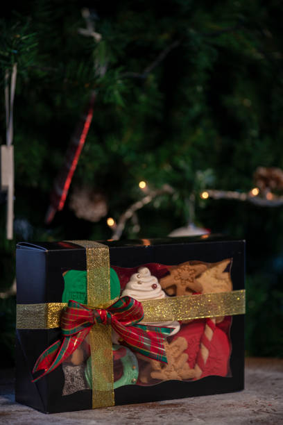 istock Christmas cookies gift boxes with christmas tree on wood table 1078806688