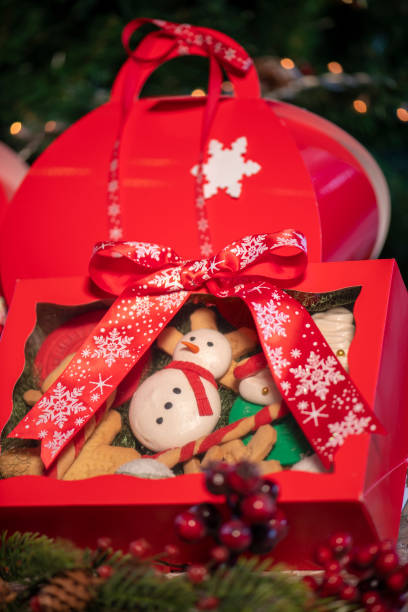 istock Christmas cookies gift boxes with christmas tree on wood table 1078816160
