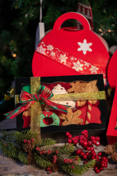 istock Christmas cookies gift boxes with christmas tree on wood table 1078818056