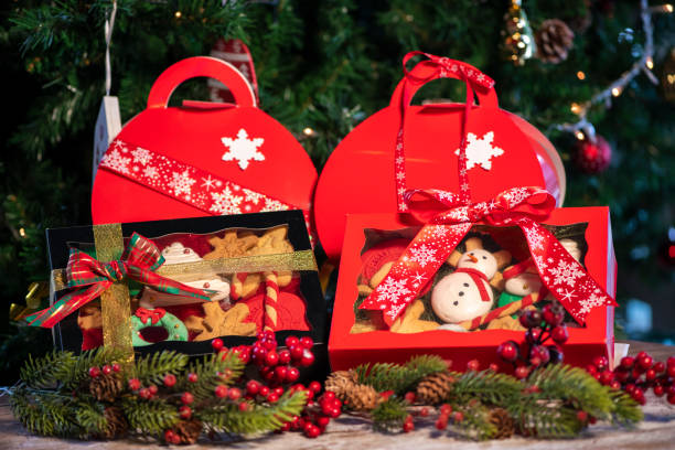 istock Christmas cookies gift boxes with christmas tree on wood table 1078818640