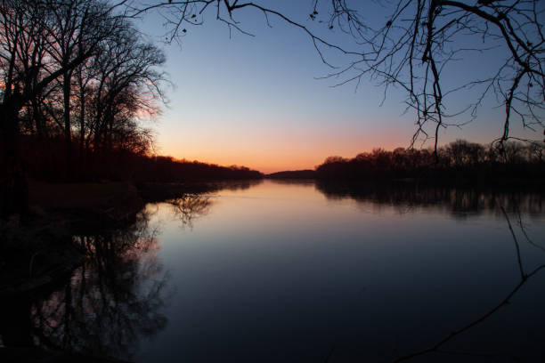 istock Sunset over the river in winter 1078825120