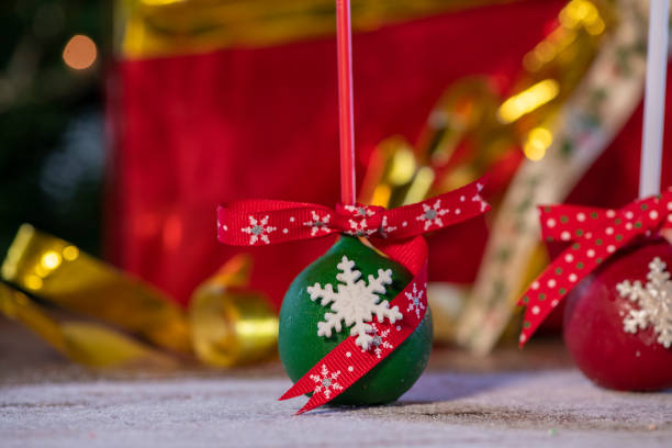 istock Various Christmas sweets and candies with christmas tree on wood table 1078831928