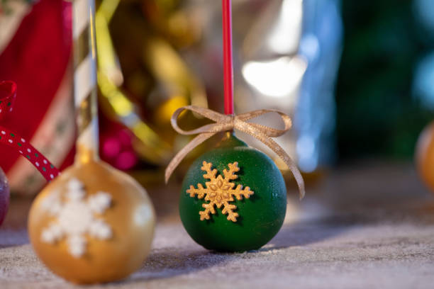 istock Various Christmas sweets and candies with christmas tree on wood table 1078832542