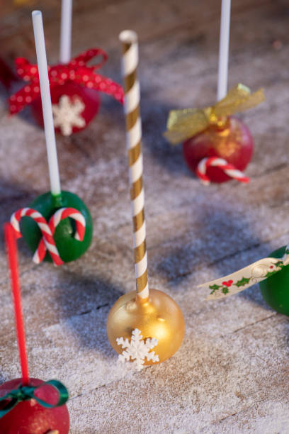 istock Various Christmas sweets and candies with christmas tree on wood table 1078839164