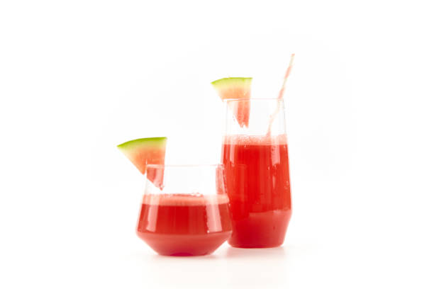 istock watermelon and juice on white background 1078856112