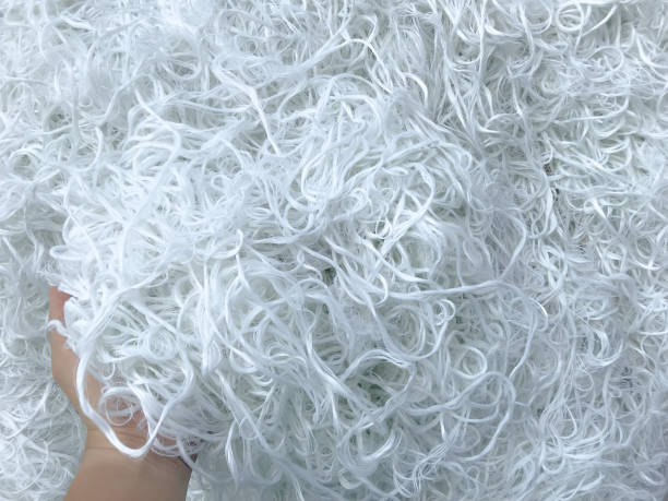 Hand holding White Polyester FDY Yarn  ,Polyester Filament Yarn. Hand holding White Polyester FDY Yarn  ,Polyester Filament Yarn. polyester photos stock pictures, royalty-free photos & images