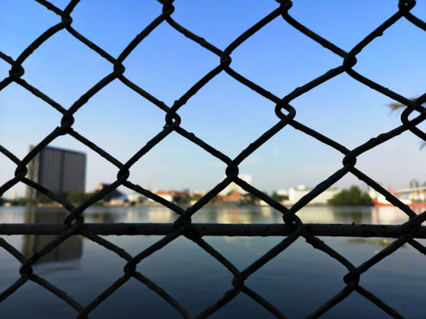 istock city view outside steel mesh. 1078869262
