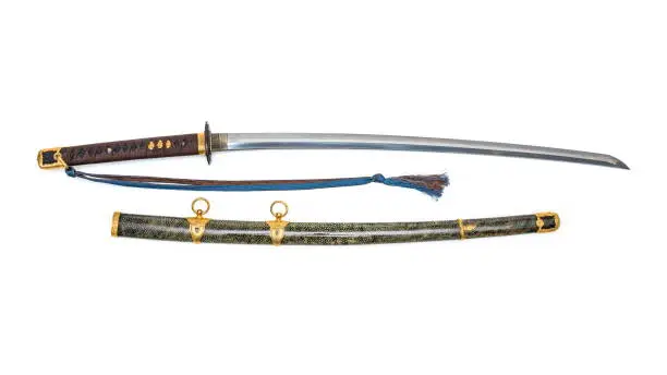 'Kai Gunto' : Japanese Marine Sword From World War 2 with scabbard wrapped by ray skin isolated in white background.