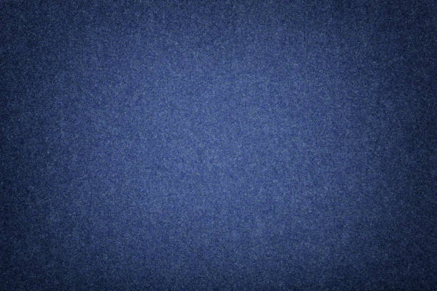 マット ネイビー ブルーのスエード生地のクローズ アップ。フェルトのベルベットの質感。 - felt blue textured textile ストックフォトと画像