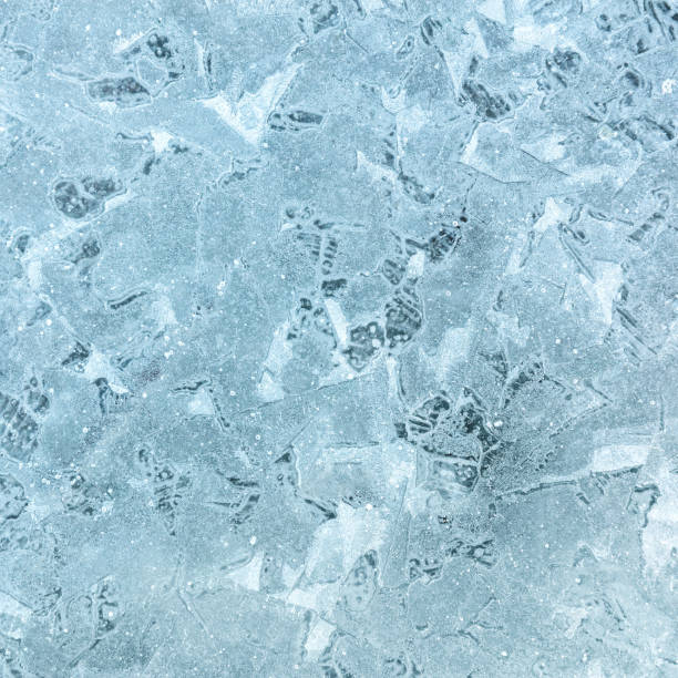 istock Ice patterns on the surface of a frozen lake 1078915402