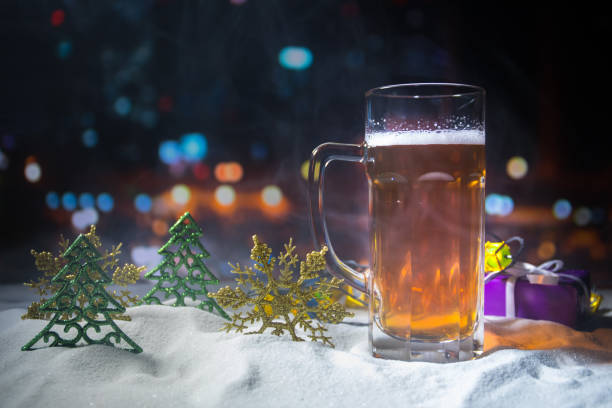 istock Christmas Beer on snow with decorative artwork 1078916022