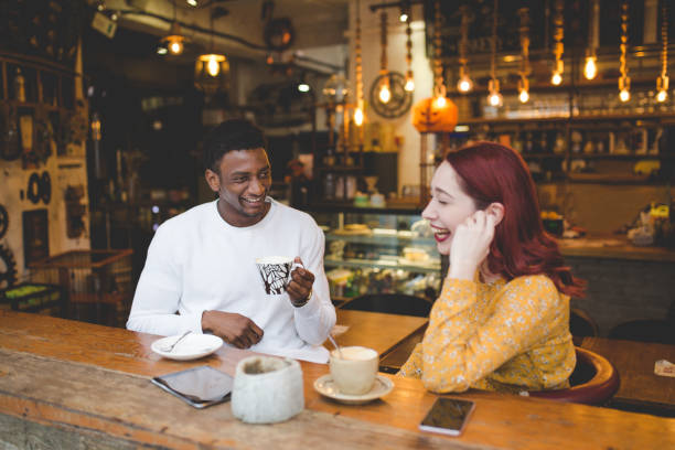 istock Friends relaxing in coffee shop 1078928966