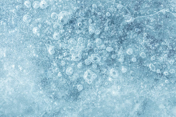 istock Texture of ice block surface with cracks, bubble patterns and scratches 1078933736