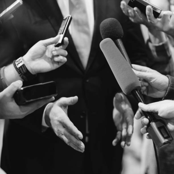 istock Cropped Hands Of Journalists Interviewing Businessman 1078934156