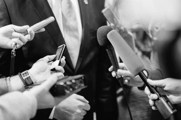 istock Cropped Hands Of Journalists Interviewing Businessman 1078934168