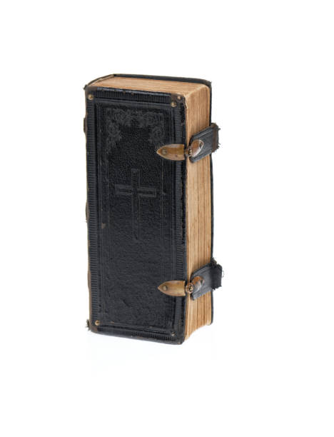 istock Old Bible isolated on white background. 1078938722