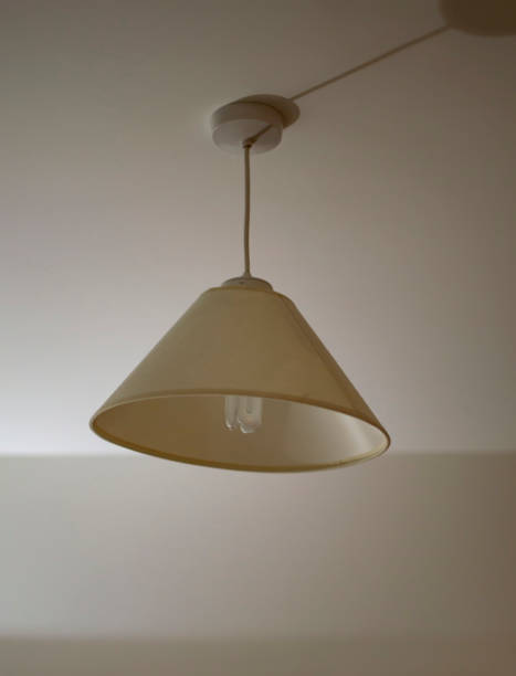 istock Hanging lamp from ceiling in the room 1078949584