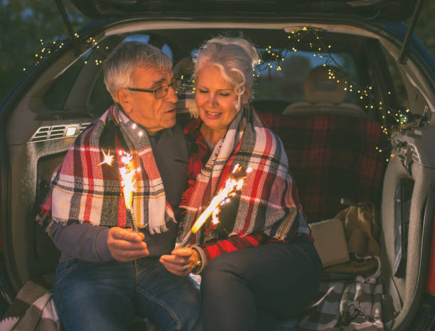 istock Senior couple outdoors with car 1078959112