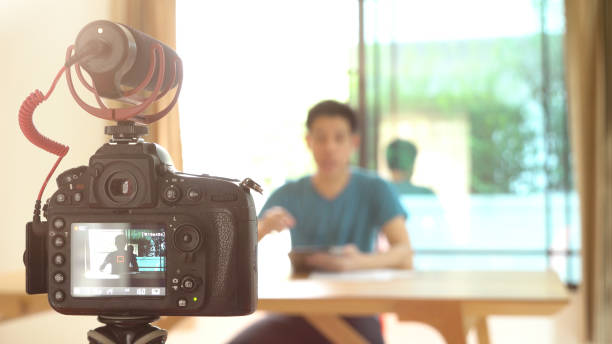 istock Man recording video for DIY stuff preparation 1078961944