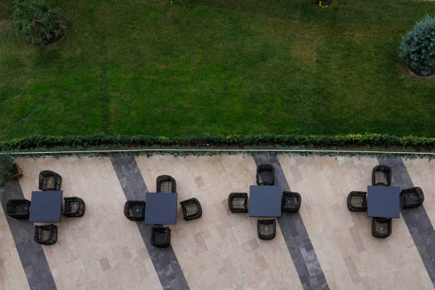 istock summer restaurant tables green grass nice place 1078963576