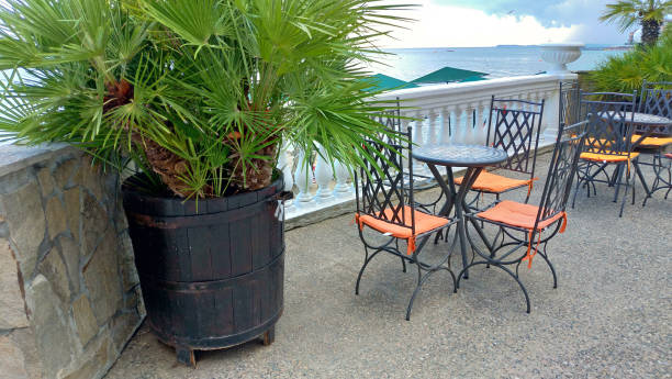 istock Empty Table and chairs in a summer cafe. Summer restaurant 1078965726