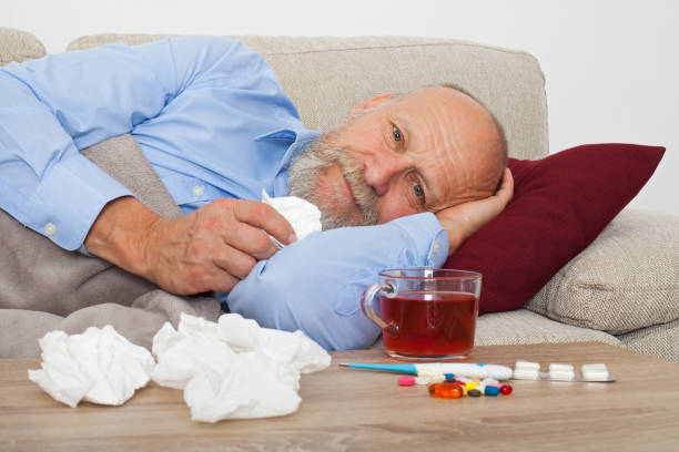 sick elderly man - painkiller thermometer tea prescription medicine imagens e fotografias de stock