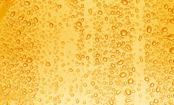 istock Water droplets on the orange background 1078967078